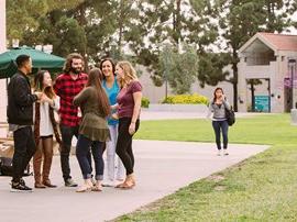 Students talking near the theatre.